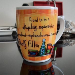 "Proud to be a Shelf Filler" Mug